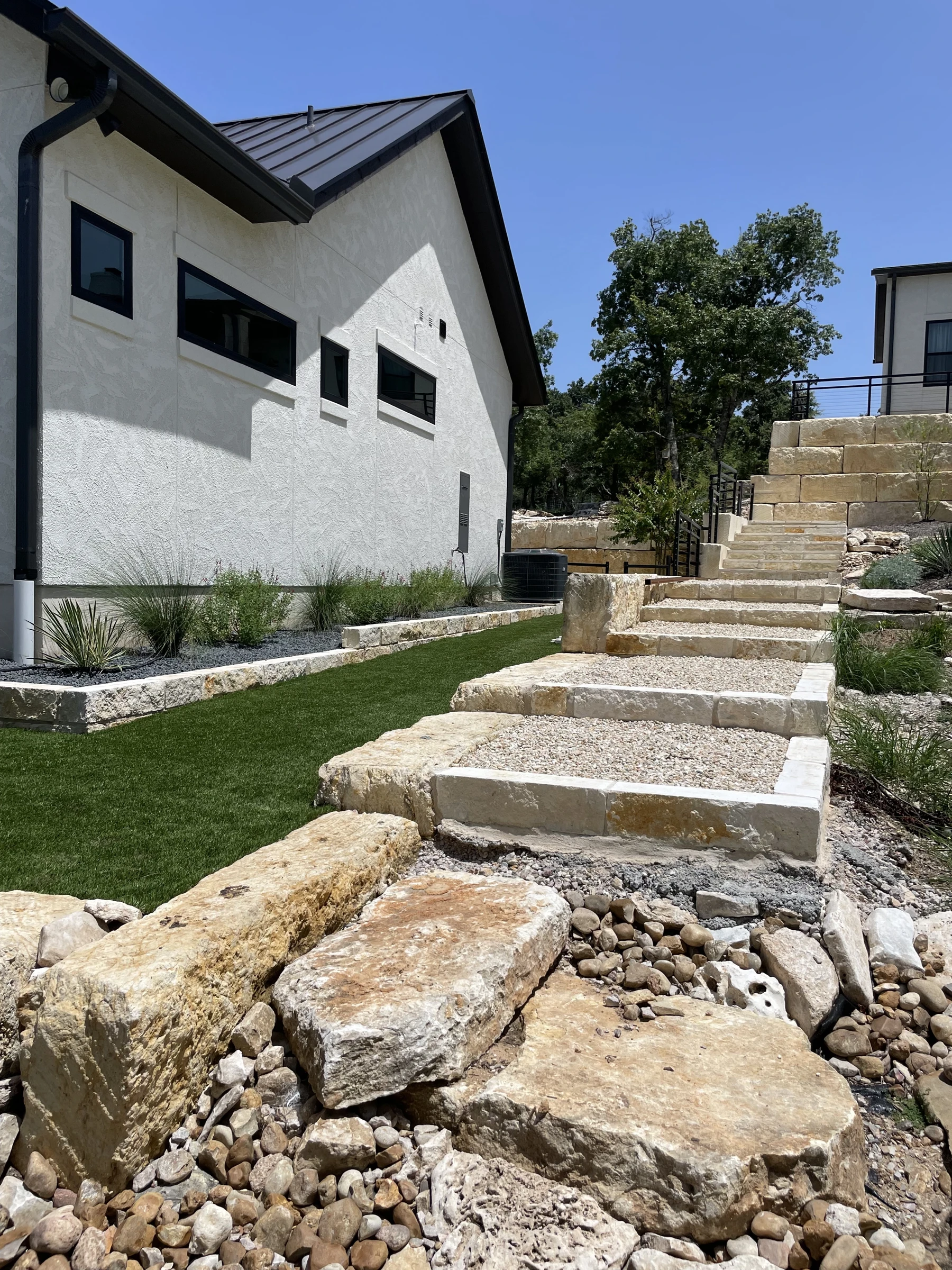 Stone steps set among planted beds