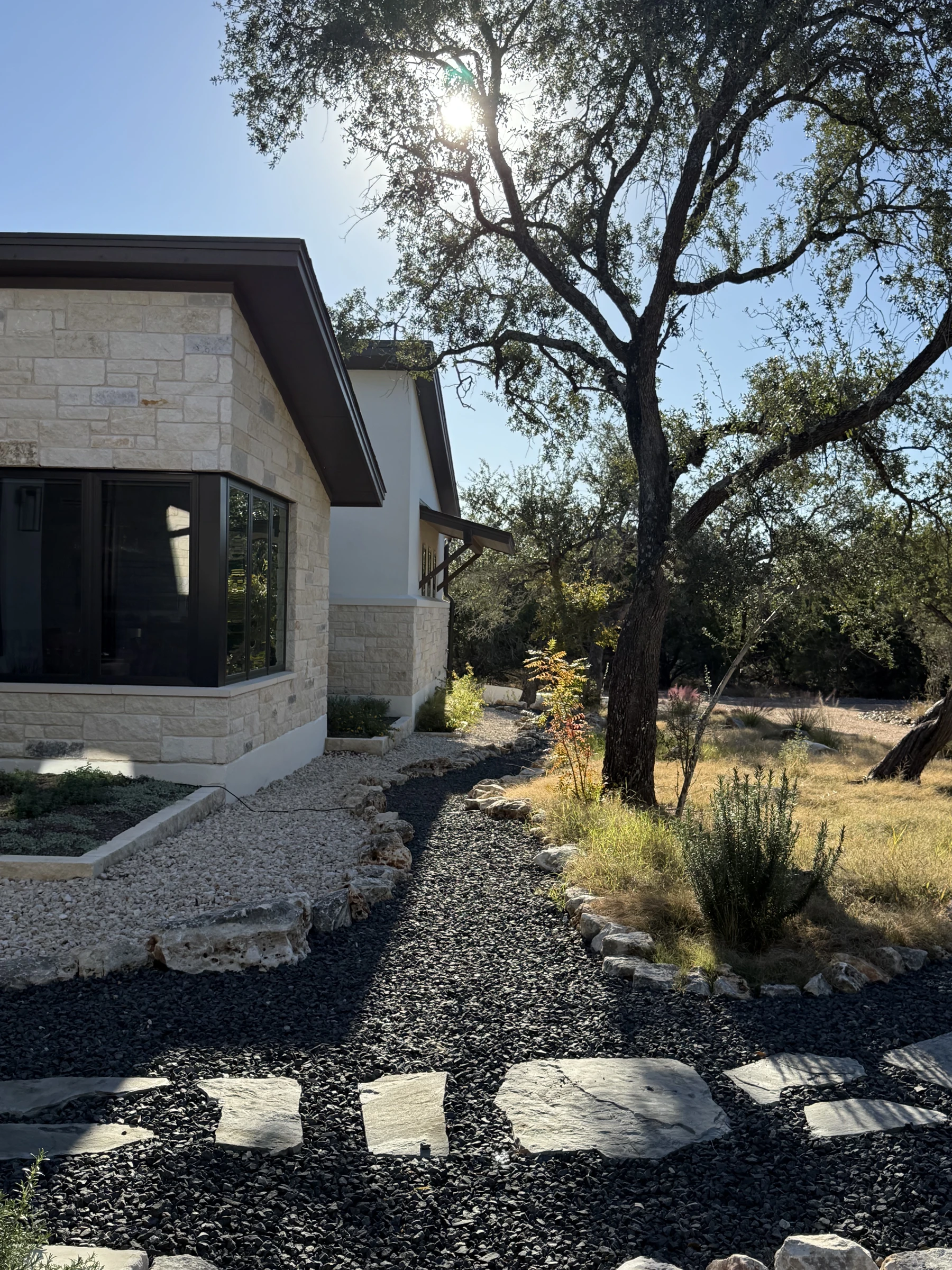 Native lawn, stone paths and established trees