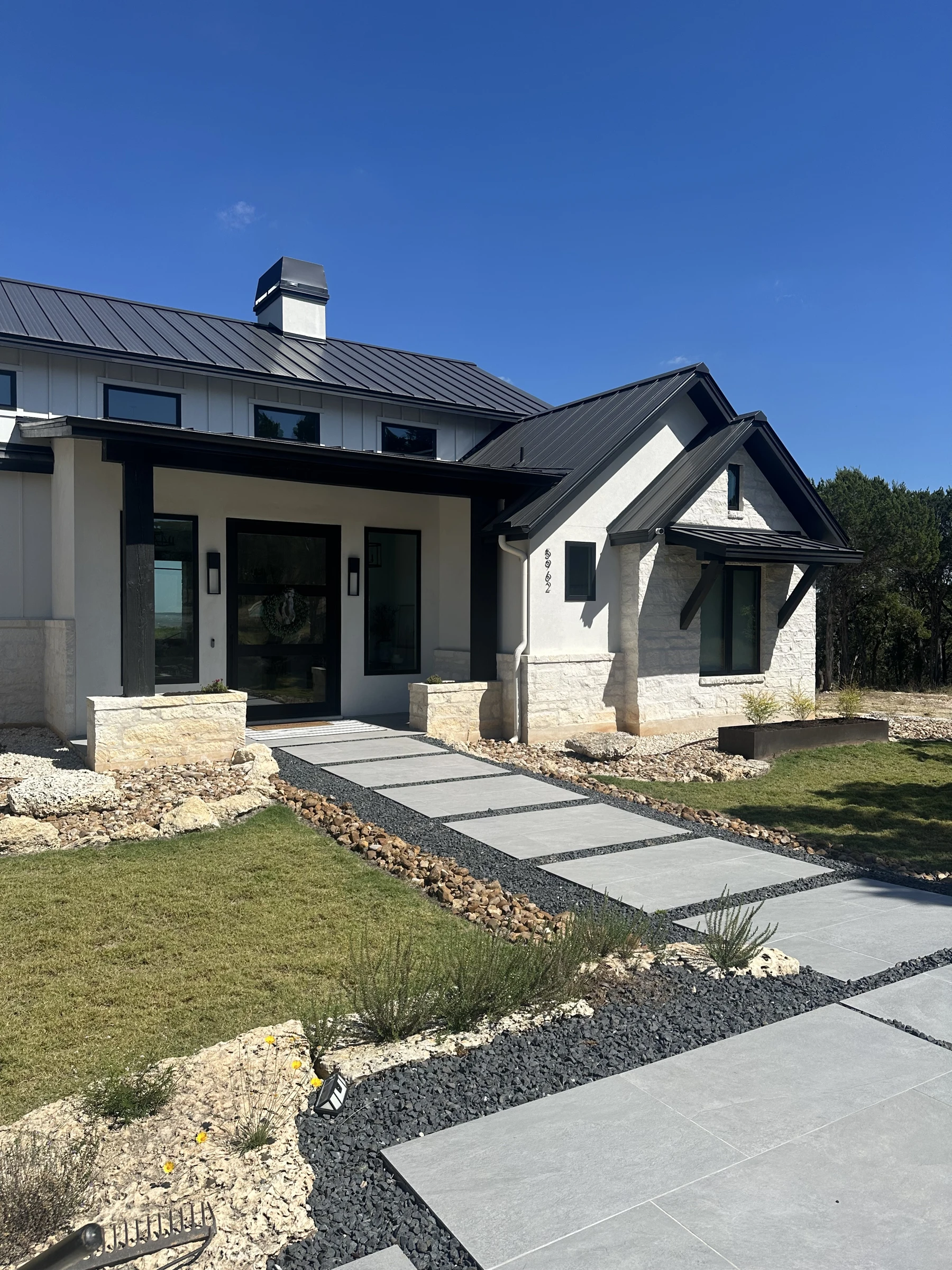 Stone paths and planting leading to a home